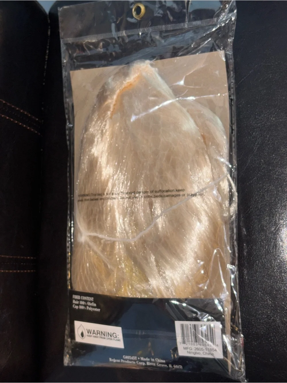 Boo Crew Halloween costume wig in blonde long hair labeled for adult use